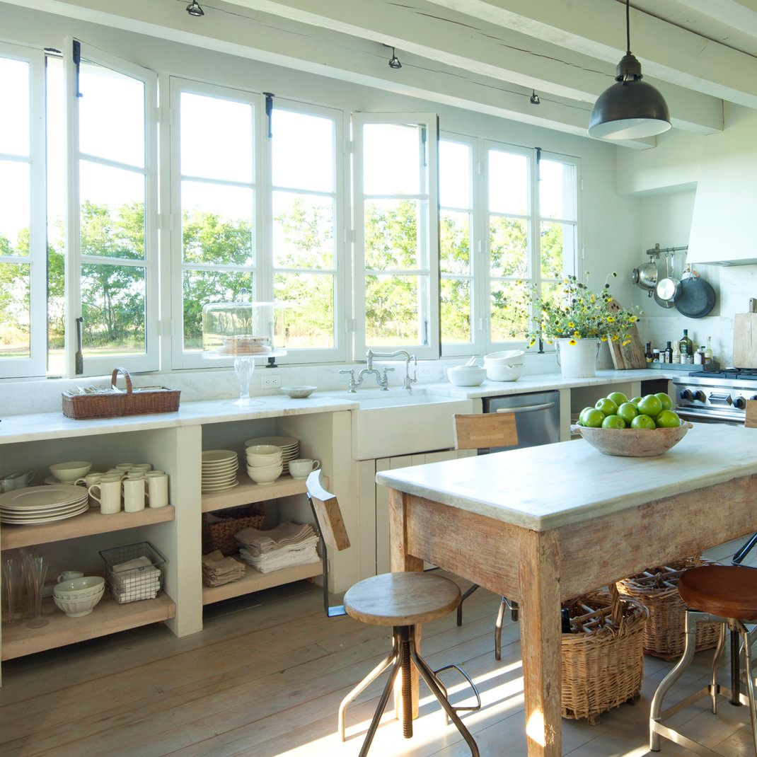 Kitchen in Eleanor Cummings designed modern French farmhouse near Round Top, TX in MILIEU magazine. #modernfrench #europeancountry