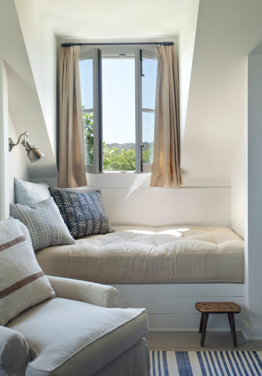 Window seat in Eleanor Cummings designed modern French farmhouse near Round Top, TX in MILIEU magazine. #modernfrench #europeancountry