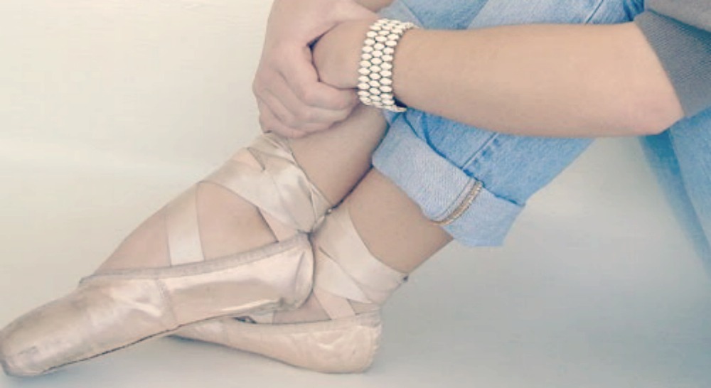 Ballet slippers, denim, and vintage bracelet. Styling and photo by Hello Lovely Studio.
