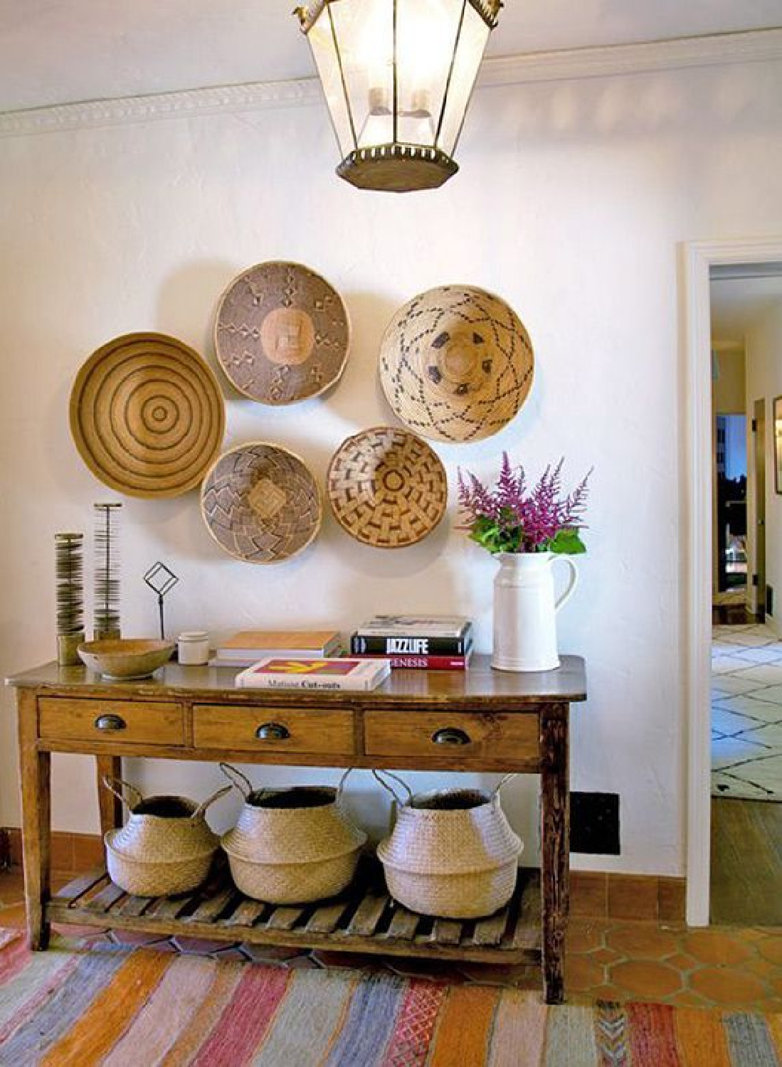 Boho style entry in the Spanish style California home from HOME AGAIN. #nancymeyers #nancymeyersmovie