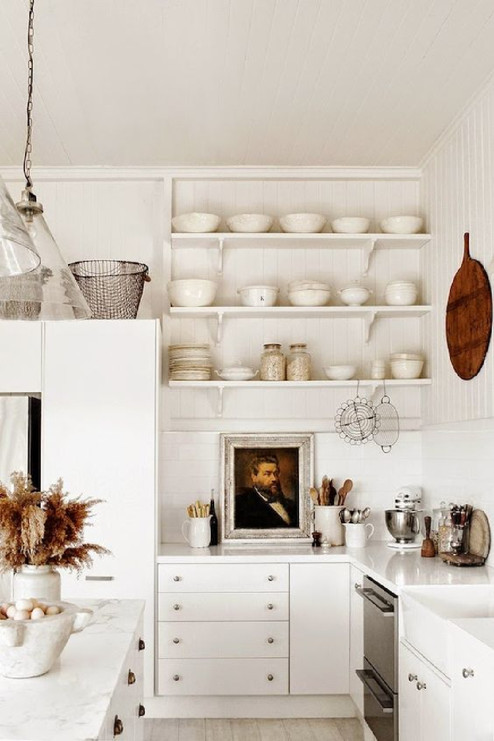 Boho, vintage, white, and serene kitchen by Kara Rosenlund.