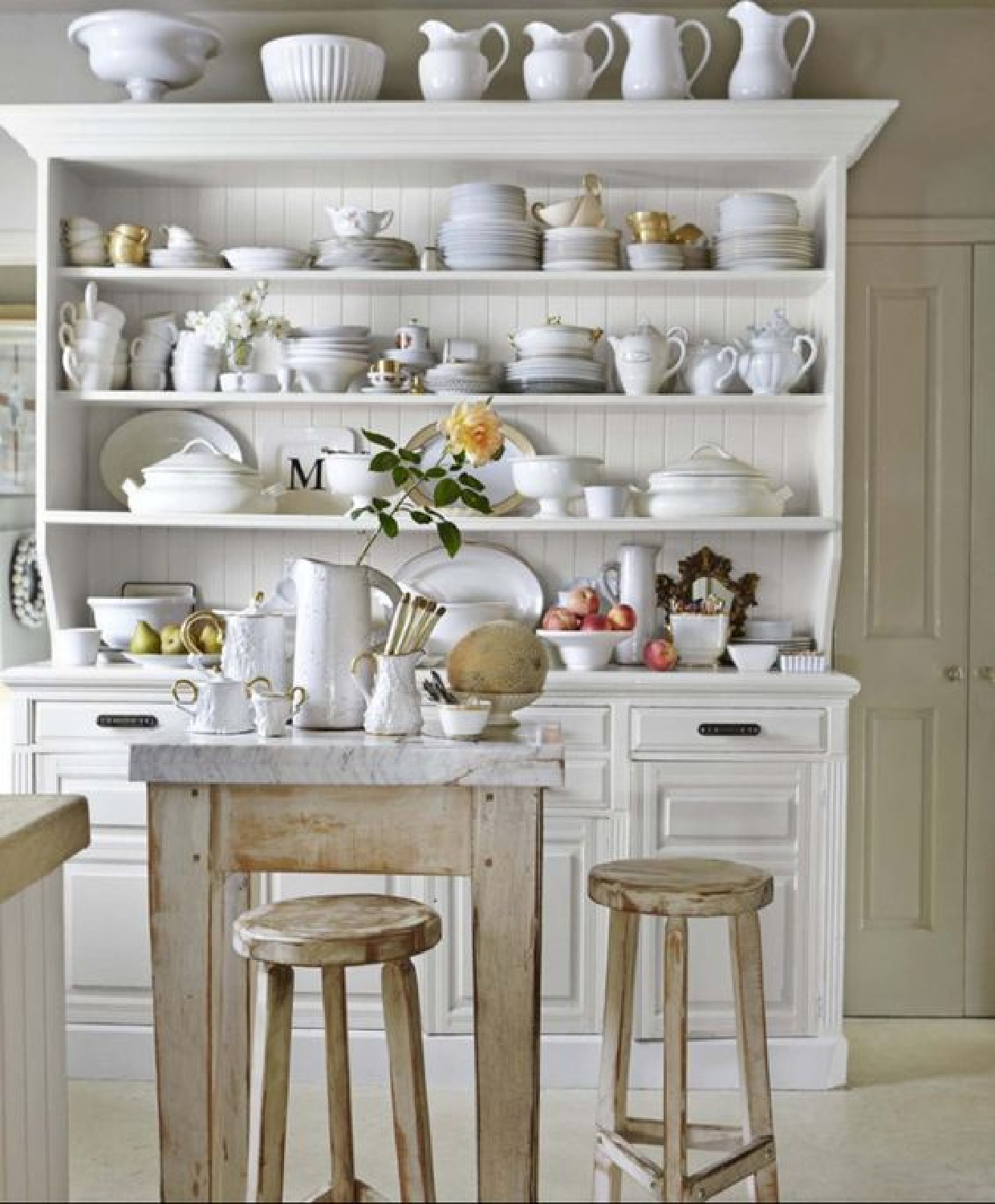 Rustic French country white country kitchen by Myra Hoefer in a Parisian inspired 1925 home.