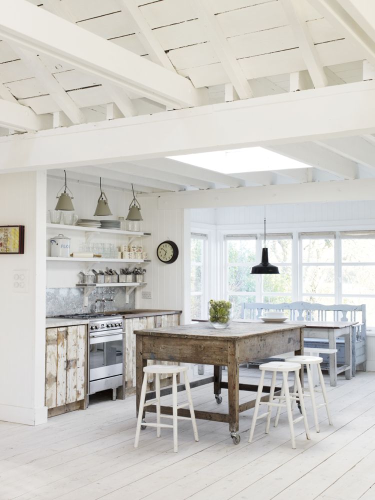 The Beach Studios - a rustic white country kitchen by Atlanta Bartlett.